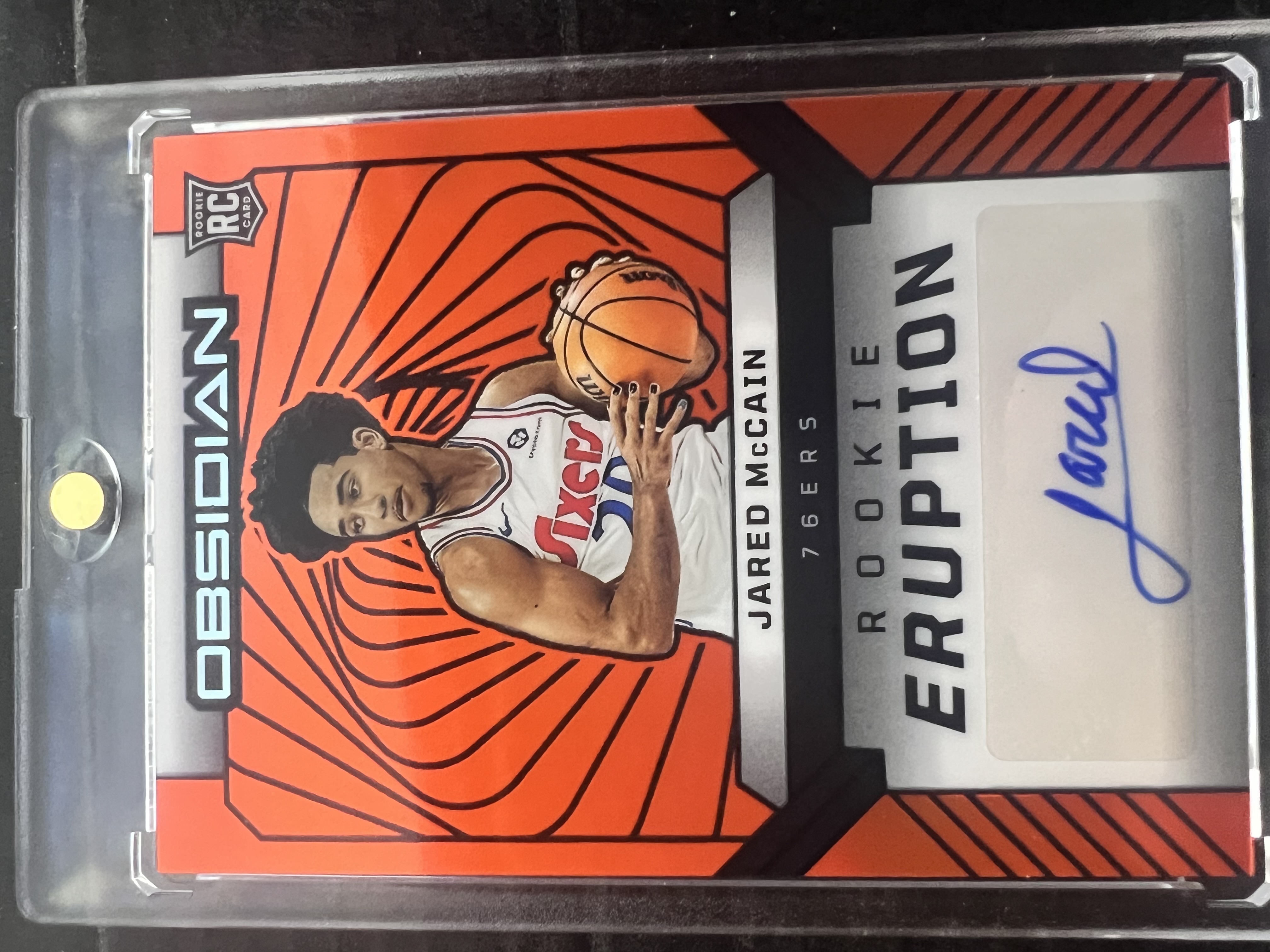 2024-25 Panini Obsidian - Jared McCain /99 RC - Orange flood ROOKIE Eruptions 76ers